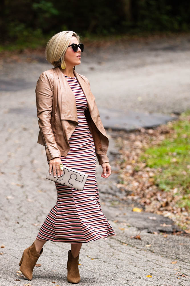 Cute spring outfit ideas under $50 featured by top US fashion blogger, Dawned on Me: image of a woman wearing an ASOS striped maxi dress